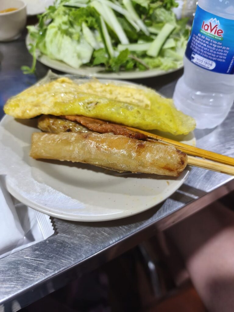 Plate with Vietnamese specialties on food tour