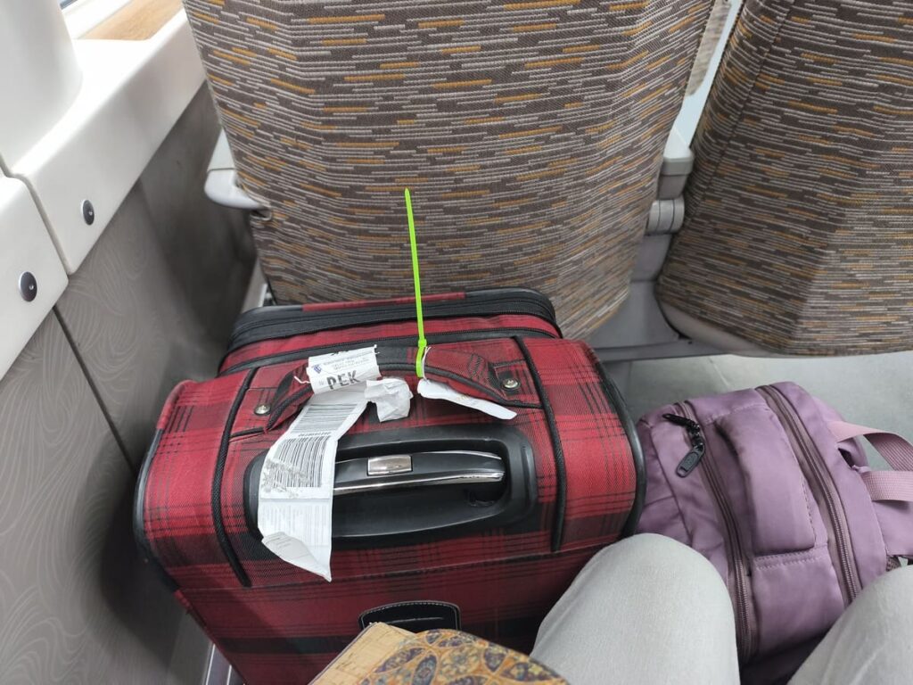 Daxing airport express train: seat with enough room for small suitcase