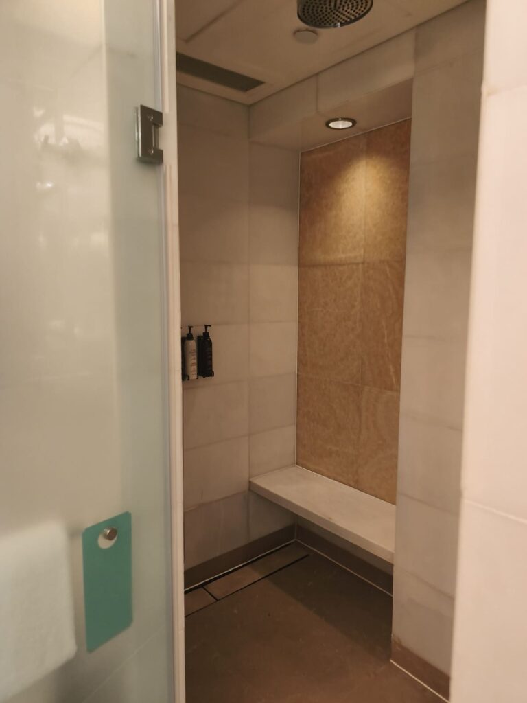 Shower room with bench at Summit Wing