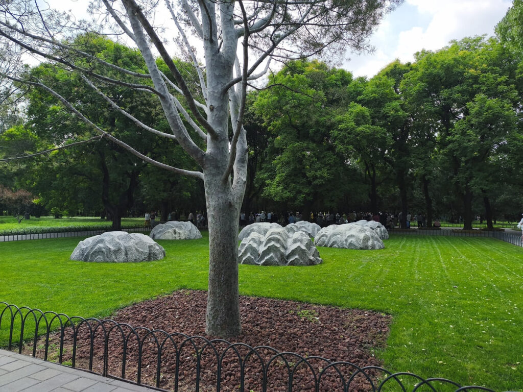 Grassy area with large carved stones in Beijing