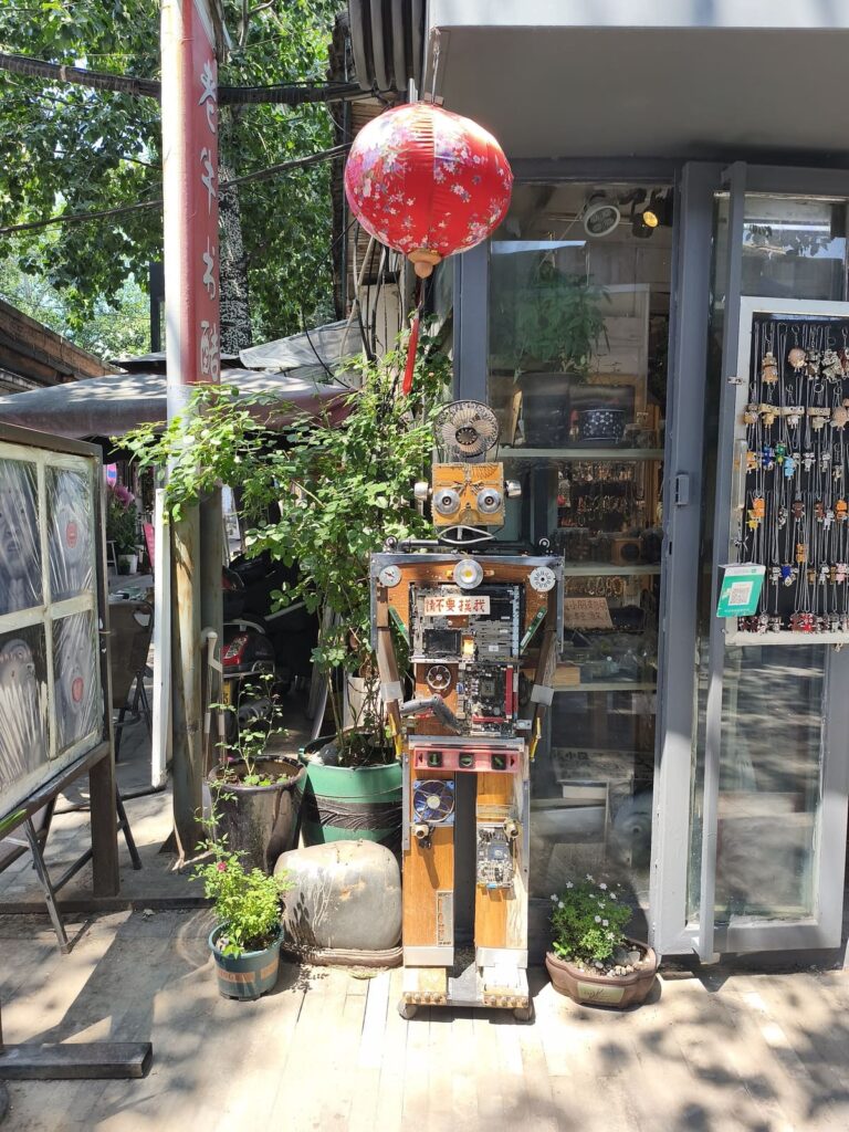 Cute store with wooden robot outside