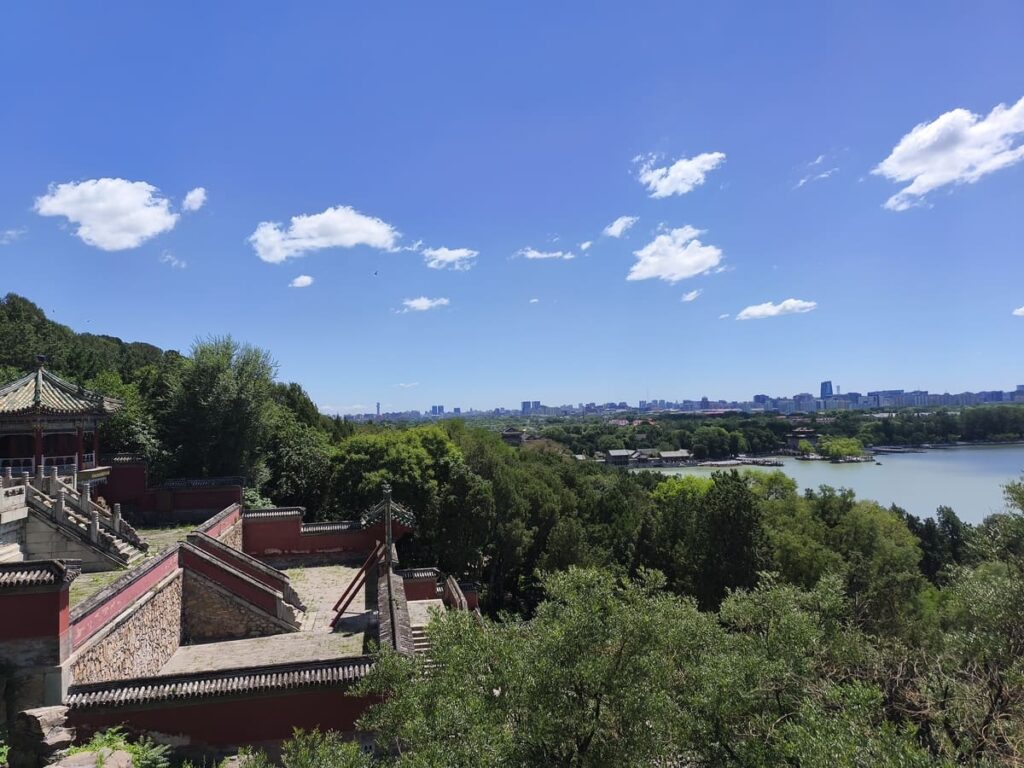 Building at New Summer Palace with view of lake and area