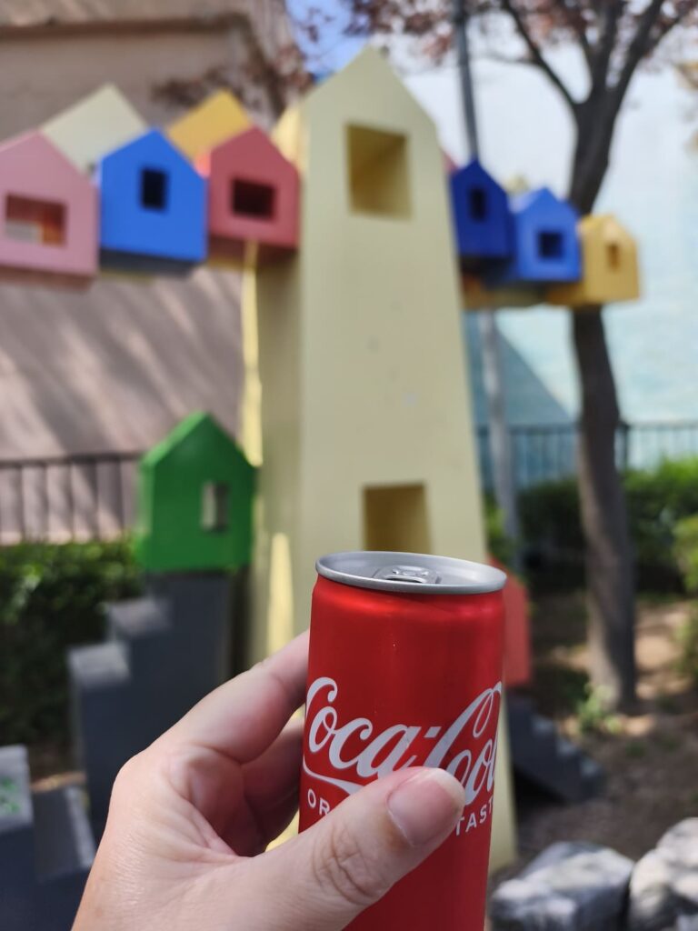 Hand holding soda