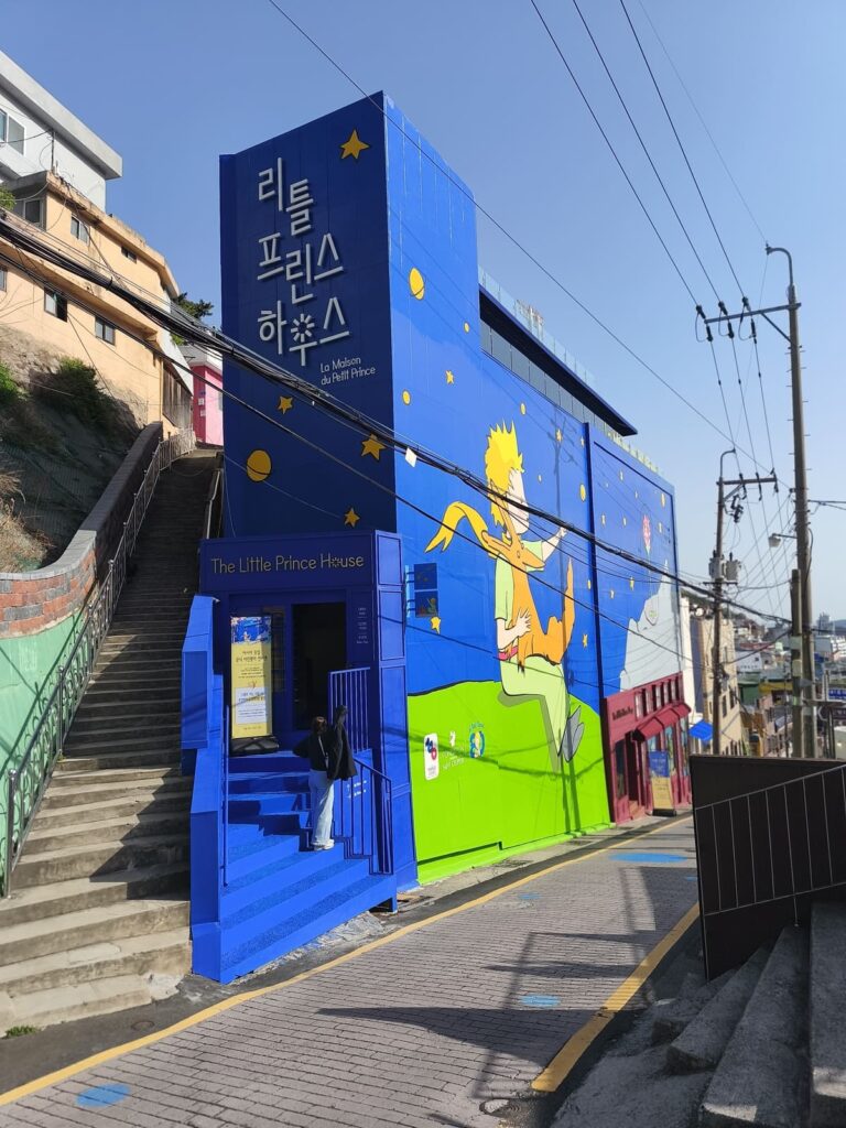 Blue building with image of Little Prince in Busan